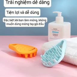 Lược gội massage đầu silicon hình giọt nước