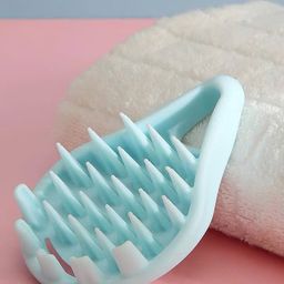 Lược gội massage đầu silicon hình giọt nước