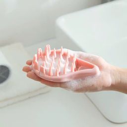 Lược gội massage đầu silicon hình giọt nước