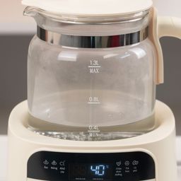 Máy đun nước pha sữa Bear WW-4H12W (Có khay hấp)