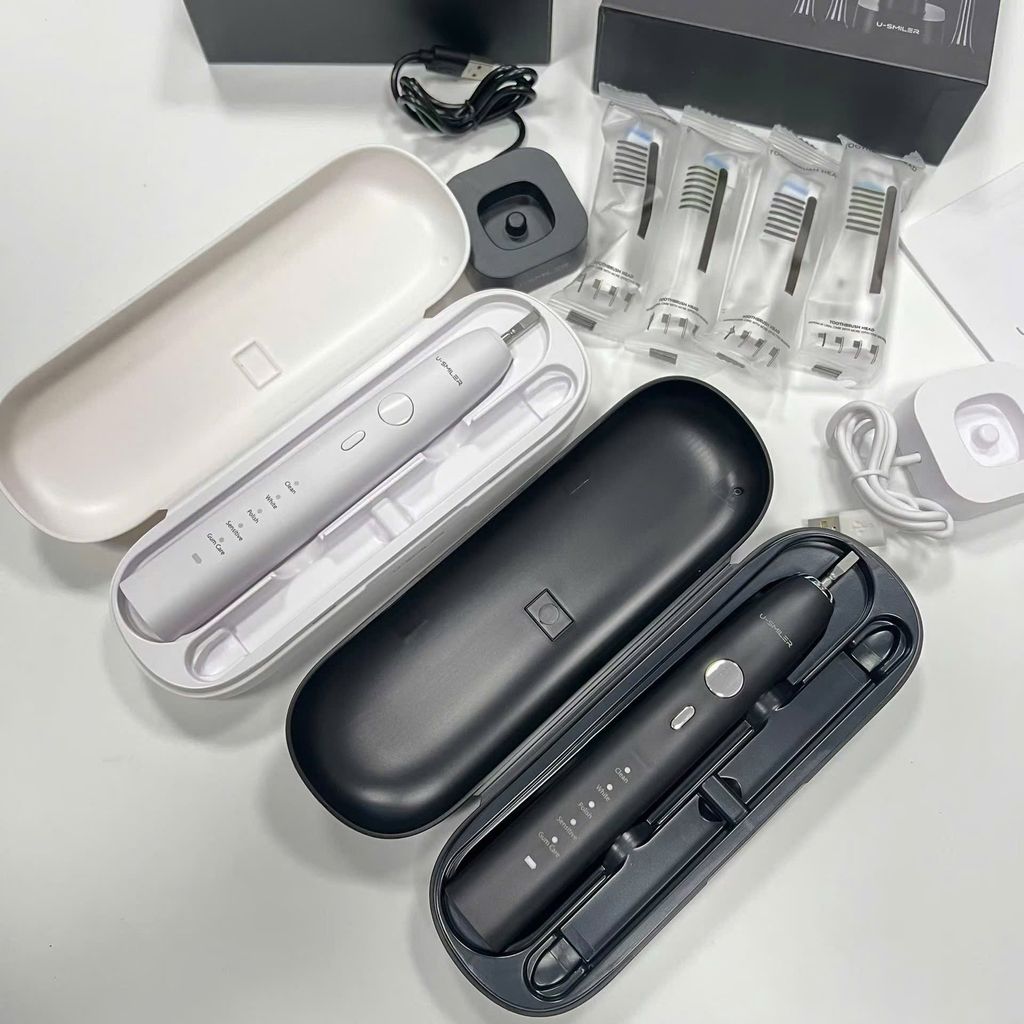 Bàn chải sóng âm U-SMILER PRO - IPX8, Tần số 84.000 nhịp, dock sạc không dây, tặng hộp + 4 đầu - ĐEN thực tế Bàn chải sóng âm U-SMILER PRO - IPX8, Tần số 84.000 nhịp, dock sạc không dây, tặng hộp + 4 đầu - ĐEN - Góc chụp chi tiết thực tế 5
